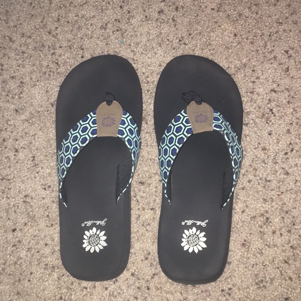 Yellow box flip flops